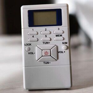 FM Pocket Radio Mini Digital Stereo with Clock and Earphones NIB